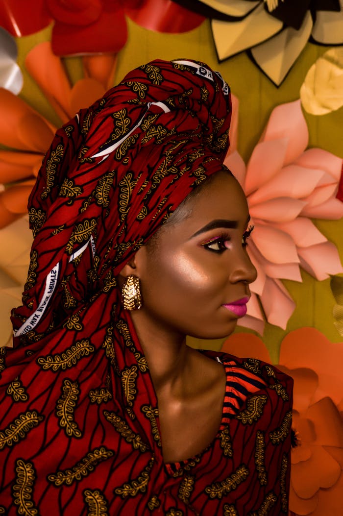 Portrait of an African woman in vibrant traditional wear in Ibadan, Nigeria.